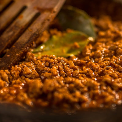 Savory minced beef sizzling, a delicious cooking process