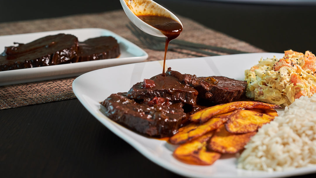 black caramelized beef with sweet plantain rice and shredded salad