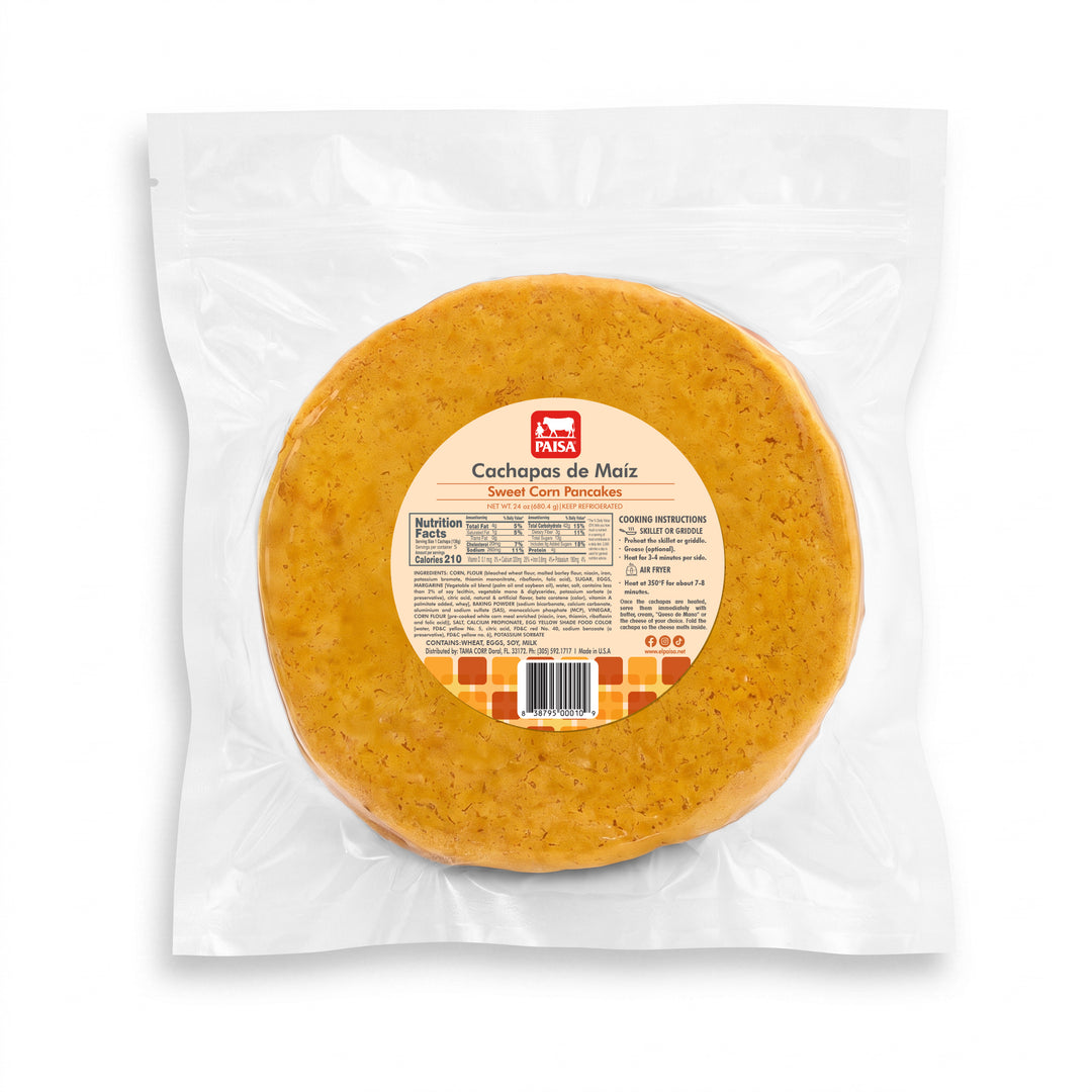 A vacuum-sealed package of round corn tortillas on a white background. The package has a clear plastic bag with a circular label in the center reading &