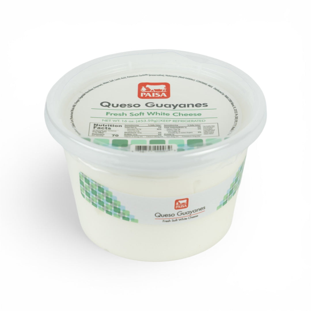 A plastic tub of Queso Guayanes fresh soft white cheese from the brand El Tuck, featuring a white label with green mosaic accents and a clear lid, set against a plain white background.