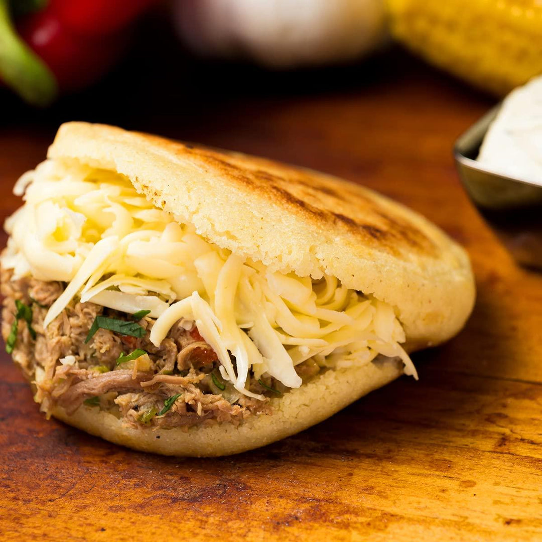 Arepa Venezolana - Venezuelan Style cornmeal Cake.