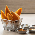 A basket of 5 just-fried Colombian Style empanadas, served with pico de gallo and three other delectable sauces, perfect for indulging